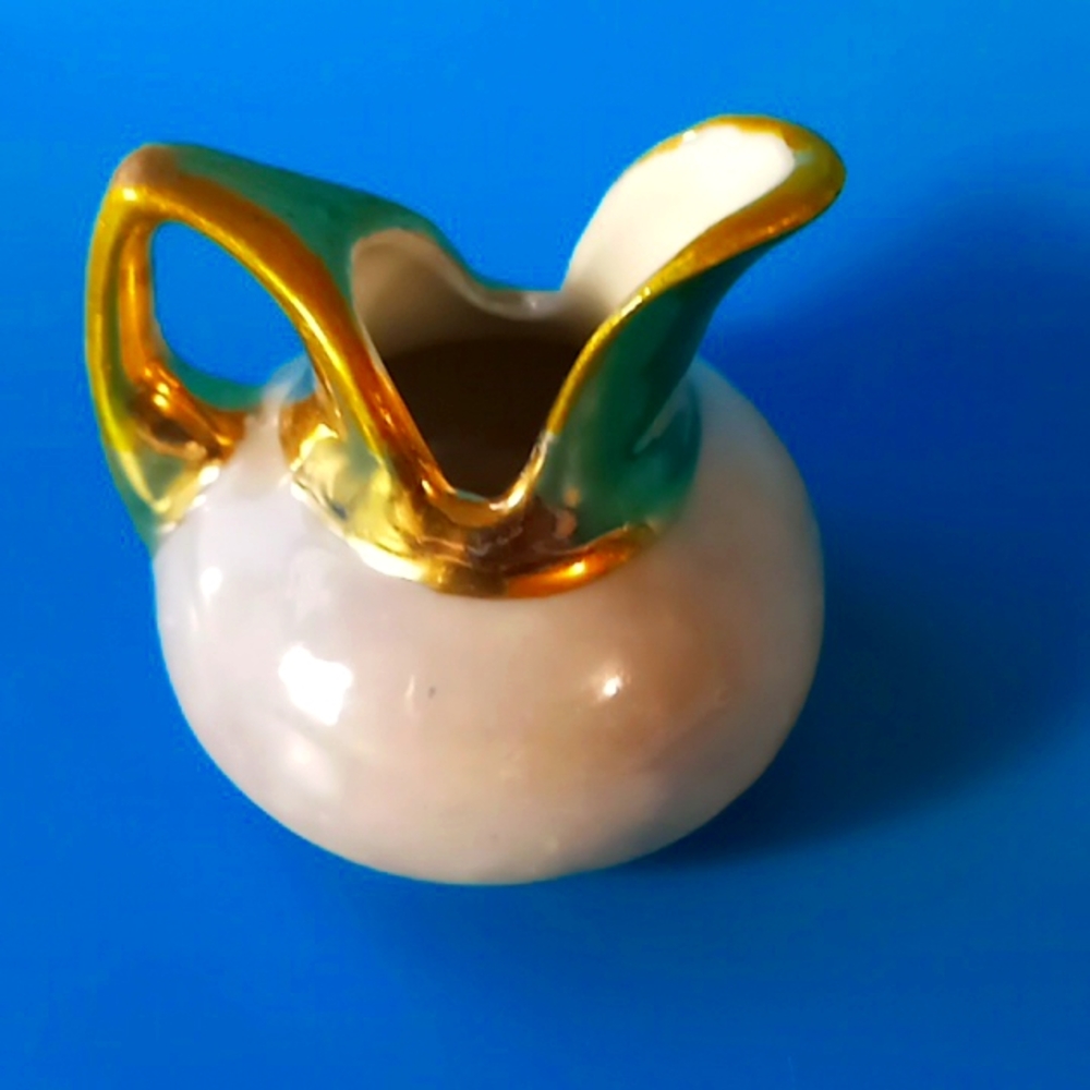 VTG Miniature Porcelain Creamer. Pink Luster With Gold Trim.